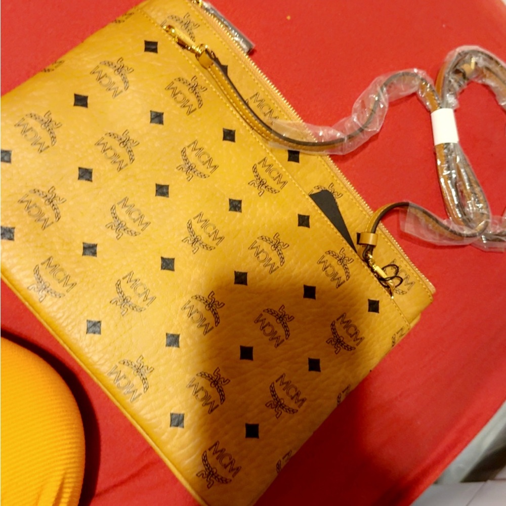 MCM Tan and Black Clutch Wristlet